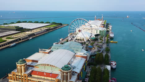 Aerial-view-flying-over-the-Navy-pier,-sunny,-summer-evening-in-Chicago,-USA