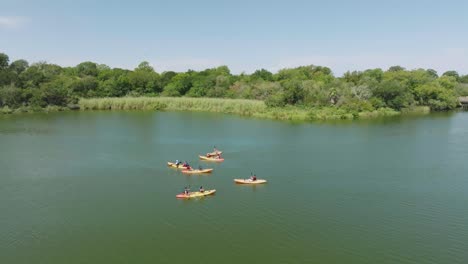 Aerial-drone-view-of-kayakers-regrouping-before-paddling-up-Armand-Bayou-at-Bay-Area-Park-in-Pasadena-Texas