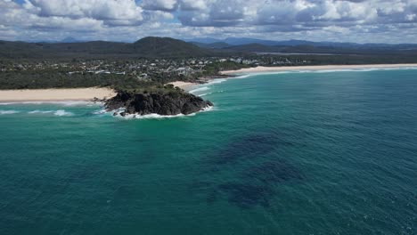 Waves-And-Ocean-At-Norries-Head-In-New-South-Wales,-Australia---aerial-drone-shot