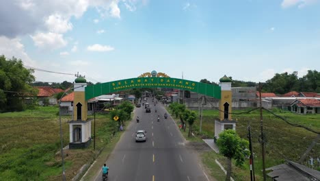 aerial-view-of-the-welcome-monument-to-the-city-of-Bangkalan,-the-city-of-Islamic-boarding-school-students-in-Madura,-East-Java