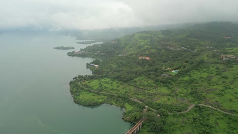 greenery-hill-station-and-small-village-in-near-pawana-lake-drone-view