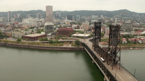 Descending-aerial-shot-of-Steel-Bridge-Portland-Oregon
