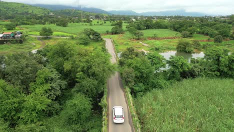 car-going-to-pawana-lake-in-greenry-village-in-pune