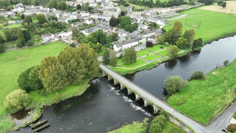 Kilkenny-Ireland-Inistioge-aerial-establishing-shot-high-over-the-river-and-village-on-a-warm-summer-day
