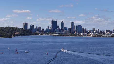 Aerial-view-trailing-a-boat-into-Perth-city