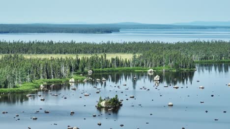 Aerial-Establishing-Shot-Showcases-the-Rugged-Beauty-of-a-Remote-Canadian-Lake