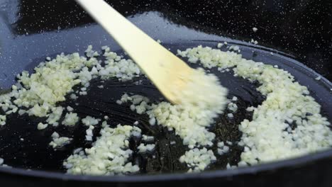Stirring-Risotto-recipe-ingredients-in-a-non-stick-pan