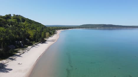 Lake-Michigan-shoreline-in-Sleeping-Bear-Bay-with-sandy-beaches,-aerial-view