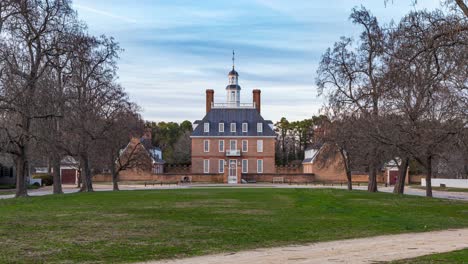 People-Passing-In-Front-Of-the-Governor's-Palace-In-Williamsburg,-Virginia,-USA