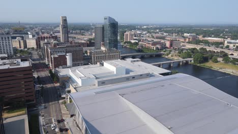 Downtown-Grand-Rapids,-with-the-DeVos-Place-in-foreground,-aerial-drone-view