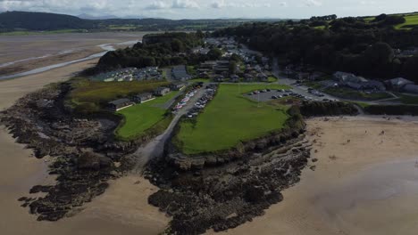 Aerial-descending-view-Red-wharf-bay-coastal-tavern-restaurant-on-the-isle-of-Anglesey,-North-Wales