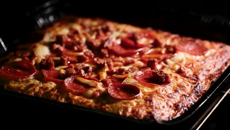 Near-ready-frozen-pizza-in-oven
