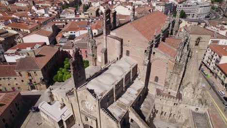 New-Cathedral-of-Plasencia,-Historic-Romanesque-style-building,-Aerial-orbiting-shot
