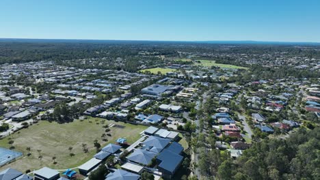 Drone-push-in-tracking-shot-of-Narangba-Brisbane-Queensland-Suburb
