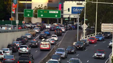 Heavy-vehicle-traffics-on-M3-Pacific-Motorway-to-Brisbane-city,-bottleneck-traffic-on-North-Quay-and-riverside-expressway-during-off-work-peak-hours,-static-shot