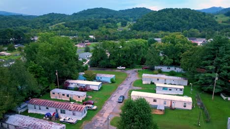low-aerial-push-over-mobile-home,-trailer-park-community-in-elizabethton-tennessee