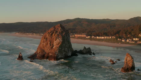 Rising-aerial-shot-of-Haystack-rock-and-Cannon-beach