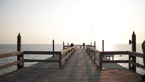 Symmetric-shot-of-the-end-point-of-the-Swakopmund-Jetty-in-Namibia-in-golden-hour