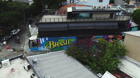 Aerial-view-of-the-text-Brasil-in-graffiti-on-building-wall-in-the-Beco-do-Batman-Alley,-Sao-Paulo,-Brazil