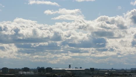 Time-Lapse-White-Clouds-Moving-Over-Toronto-Airport