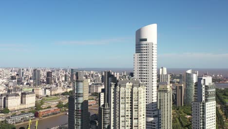 Aerial-panoramic-view-of-the-tallest-skyscraper-in-Puerto-Madero,-Buenos-Aires