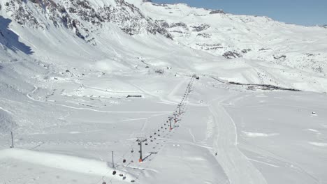 Ski-Lift-Landscape-Mountains-in-Farellones-Resort-Chile-Aerial-Drone-Shot-Across-Andean-Cordillera