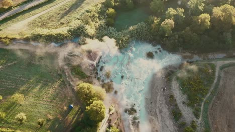 Cascate-del-Mulino,-Soothing-Natural-Hot-Springs-Bath,-Saturnia,-Tuscany,-Italy,-Europe,-Drone-view-fixed-shot