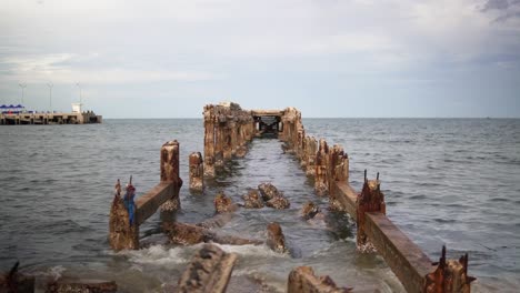 Old-Damaged-Fishing-Pier-In-Prachuap-Khiri-Khan-Bay-In-The-Coastal-Village-Of-Hua-Hin,-Thailand