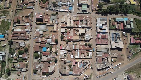 Downtown-of-growing-Loitokitok-town-in-Southen-Kenya,-aerial-top-down-view