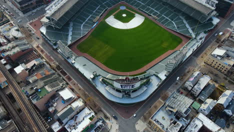 Aerial-view-flying-backwards-away-from-the-Wrigley-Field-the-Chicago-Cubs-stadium