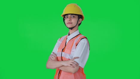 Portrait-of-Indian-female-architect-standing-crossed-hands-Green-screen