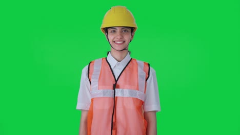 Happy-Indian-female-architect-smiling-Green-screen
