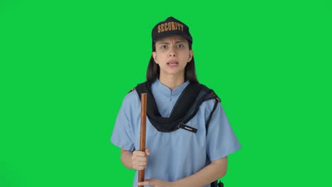 Angry-Indian-female-security-guard-arguing-with-someone-Green-screen