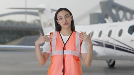 Happy-Indian-ground-staff-girl-working-talking-to-someone