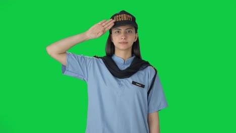 Indian-female-security-guard-saluting-Green-screen