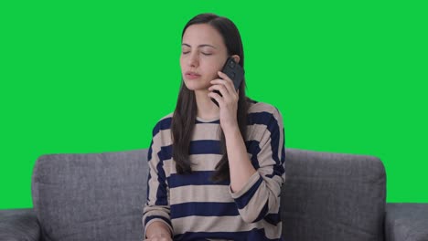Indian-girl-talking-on-phone-Green-screen