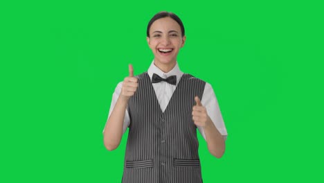Happy-Indian-woman-waiter-showing-thumbs-up-Green-screen