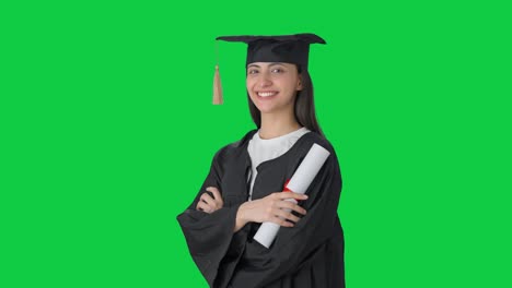 Portrait-of-Happy-Indian-college-girl-standing-crossed-hands-Green-screen