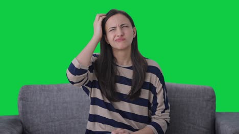 Confused-Indian-girl-thinking-something-Green-screen