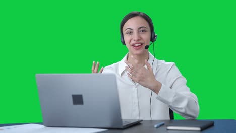 Happy-Indian-call-center-girl-talking-to-someone-Green-screen