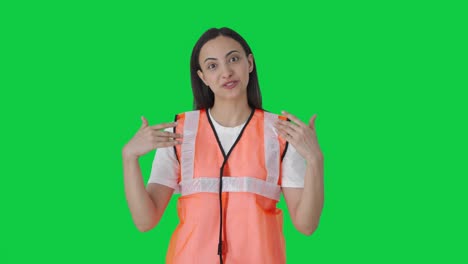 Happy-Indian-ground-staff-girl-working-talking-to-someone-Green-screen