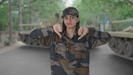 Disappointed-Indian-woman-army-officer-showing-thumbs-down
