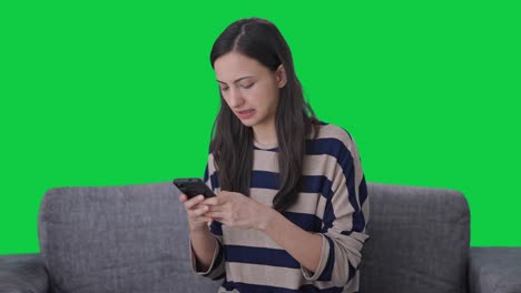 Angry-Indian-girl-chatting-with-someone-Green-screen