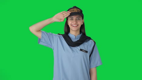 Happy-Indian-female-security-guard-saluting-Green-screen