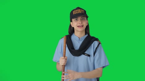 Angry-Indian-female-security-guard-shouting-on-someone-Green-screen