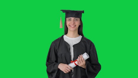 Happy-Indian-college-graduate-girl-holding-degree-Green-screen