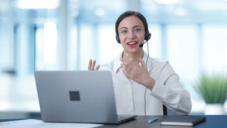 Happy-Indian-call-center-girl-talking-to-someone