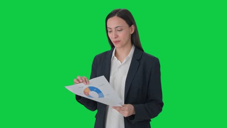 Happy-Indian-female-manager-discussing-project-with-employees-Green-screen