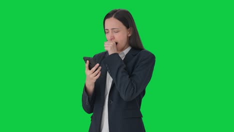Tired-and-lazy-Indian-business-woman-using-phone-Green-screen