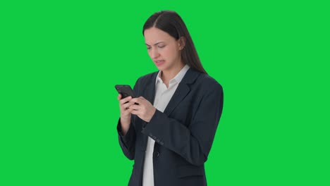 Angry-female-manager-chatting-with-someone-Green-screen